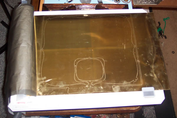 Design transferred onto the brass